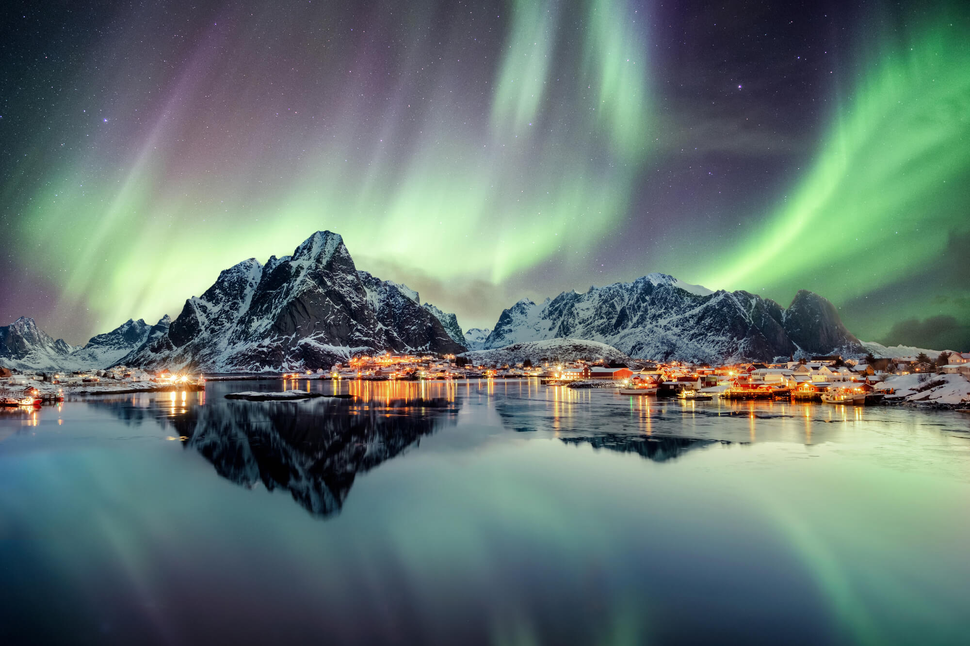 norway lofoten aurora over mountains reine istk