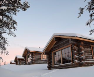 finland lapland muotka log cabins sunset mldge
