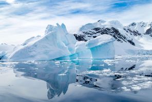 antarctica paradise bay iceberg reflection istk