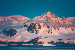 antarctica pink reflection on mountains istk