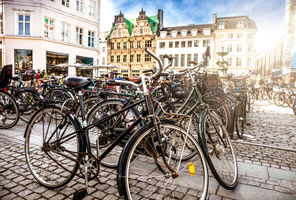 denmark bicycles in town square copenhagen istk