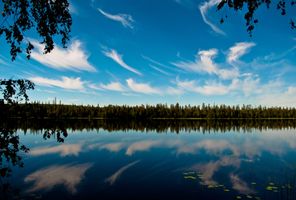 east finland clouds reflected in lake jarvimaisema hk