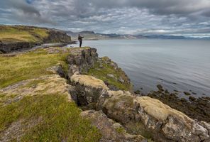 iceland snaefellsnes arnarstapi person admiring view rth