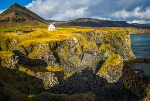 iceland snaefellsnes peninsula house by cliffs arnarstapi istk