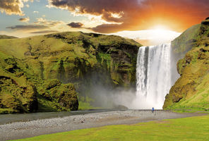 iceland south west skogafoss midnight sun istock