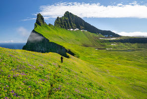 iceland woman hiking hornstrandir west fjords astk