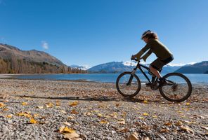 new zealand cycling by lake wanaka autumn istk