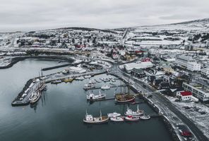 north iceland aerial view of husavik harbour winter istk