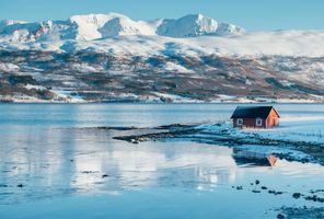 northern norway red cabin beside malangsfjord winter gt