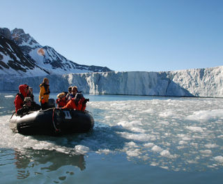 arctic spitsbergen zodiac group at glacier front rp