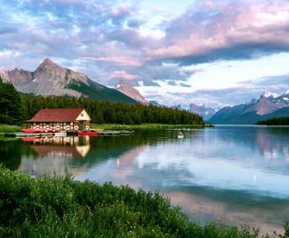 canada alberta maligne lake boathouse pink sky adstk