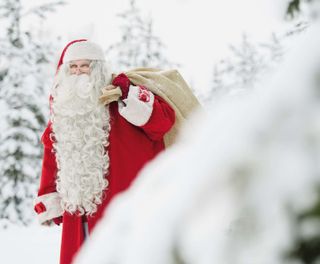 finland santa claus with sack in lapland2 vf