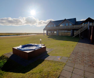 iceland south west hotel ranga rear hot tub sunburst