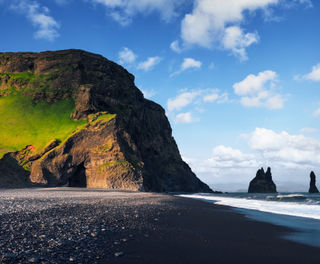 iceland south west reynisfjara beach lone figure istk