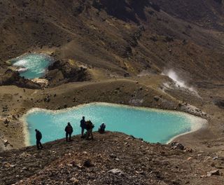 new zealand tongariro national park emerald lakes hikers istk