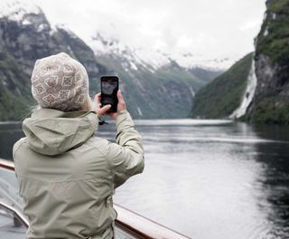 norway geirangerfjord photographing the view from deck havila