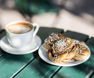 swedish fika cinnamon bun and coffee vs