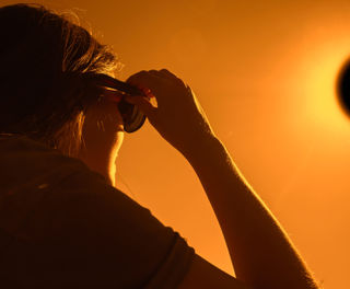 woman-viewing-solar-eclipse-astk