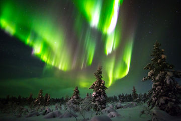 The aurora dances over saariselka region in Finnish Lapland