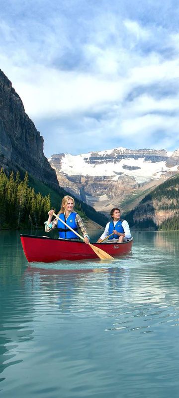 alberta fairmont chateau lake louise hotel canoeing couple