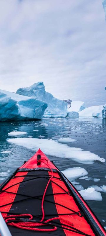 antarctic peninsula kayaking through icebergs pov istk