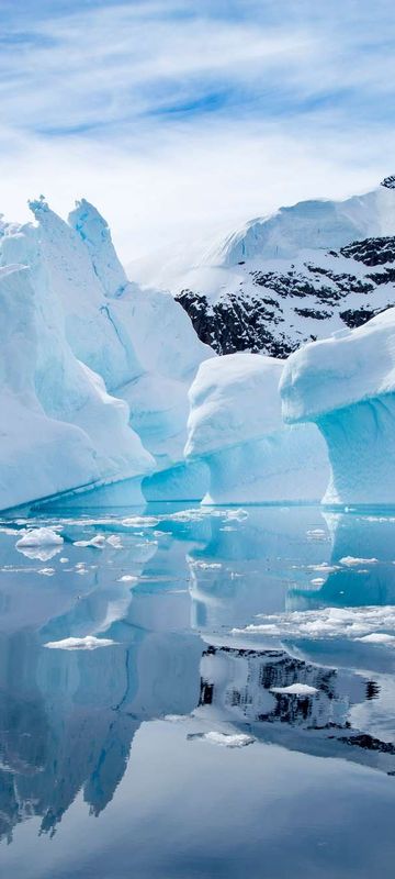 antarctica paradise bay iceberg reflection istk