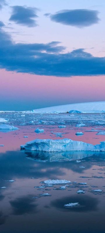 antarctica pink sunset over weddell sea istk