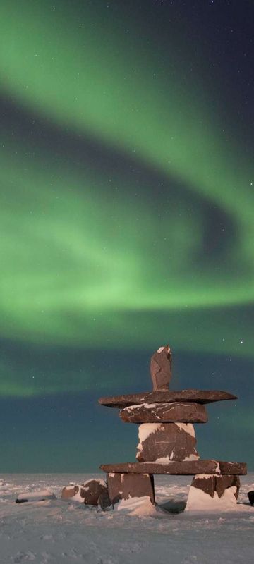 canada manitoba churchill northern lights over inukshuk nh