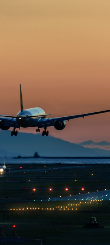 canada plane landing at sunset istk