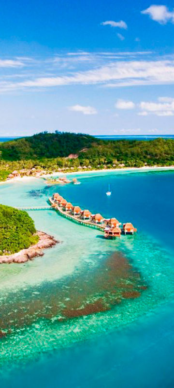 fiji likuliku island resort aerial view overwater bures lir