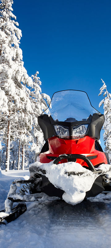 finland lapland snowmobile front on taiga istk