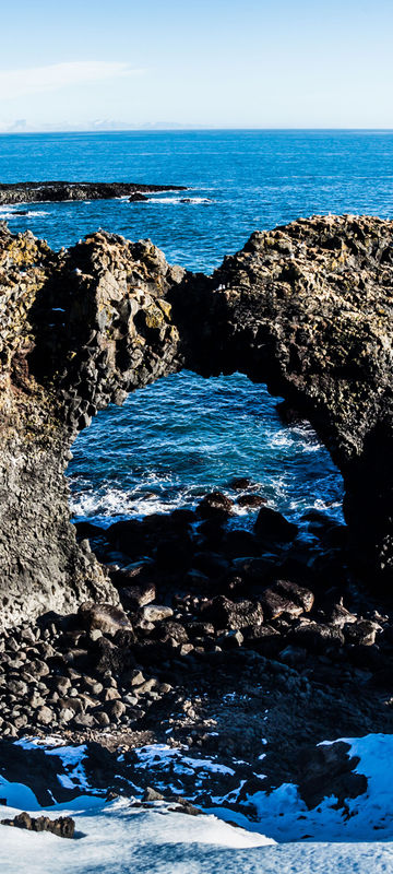 iceland snaefellsnes arnarstapi rock arch winter istk