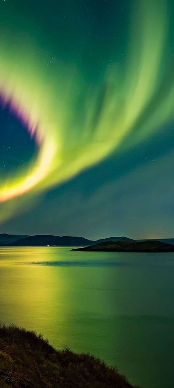 northern lights over thingvellir in south west iceland