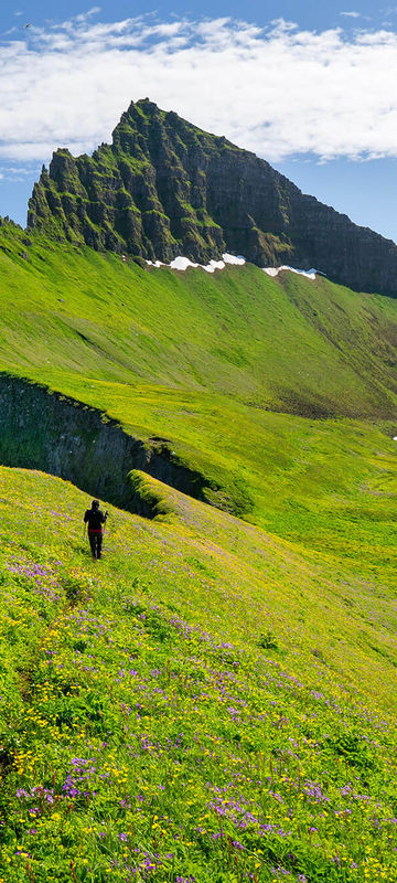 iceland woman hiking hornstrandir west fjords astk