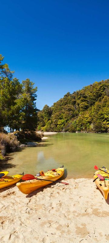 new zealand abel tasman kayaks on shore istk