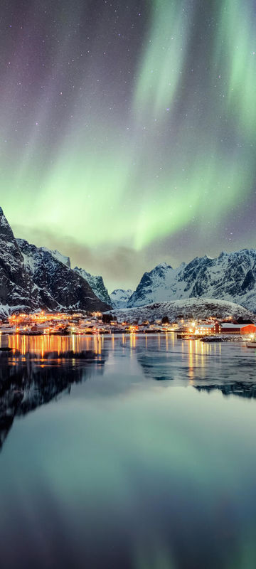 norway lofoten aurora over mountains reine istk