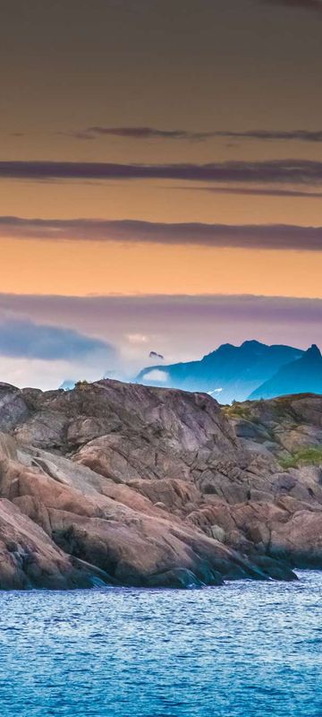 norway midnight sun over lofoten landscape istk