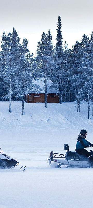 sweden lapland snowmobile pair icehotel rth