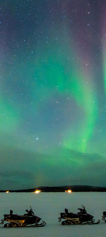 swedish lapland icehotel northern lights by snowmobile