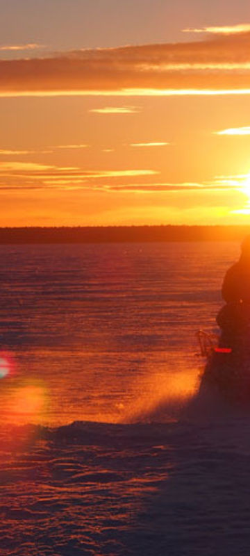 swedish lapland snowmobile tour to the lulea archipelago sunset