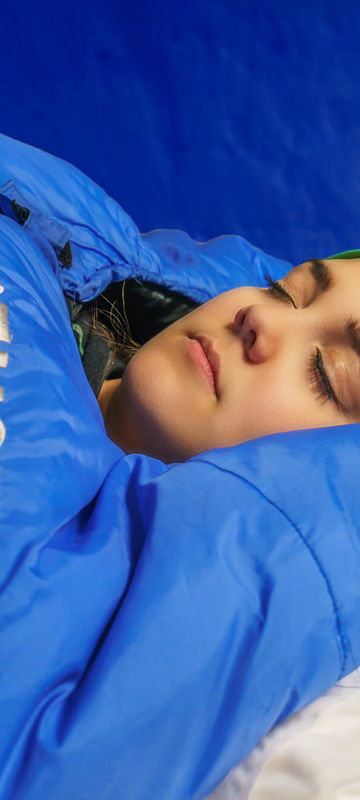 sweden-icehotel-sleeping-on-ice-in-sleeping-bag-rth