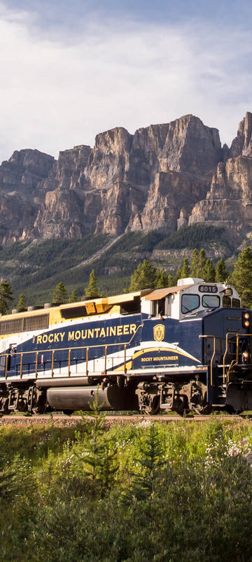 canada-alberta-rocky-mountaineer-passing-castle-mountain-rm