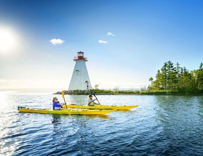 canada nova scotia kayaking past kidston lighthouse baddeck nstb