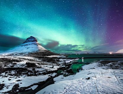 iceland snaefellsnes kirkjufell pink aurora istk