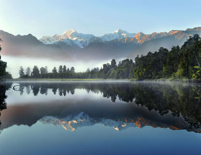 new zealand west coast lake matheson misty morning sstk