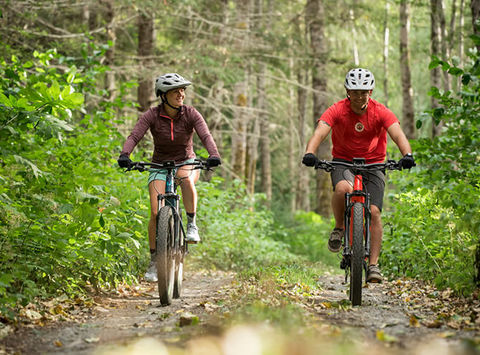 canada tweedsmuir park lodge ebikes through forest
