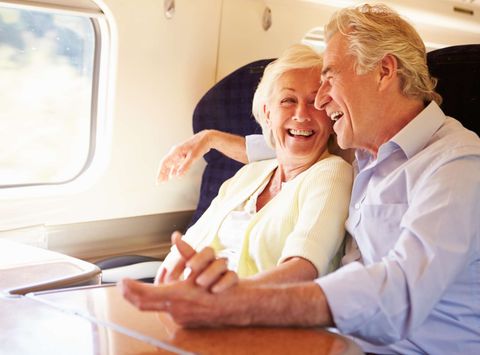 couple relaxing on train astk