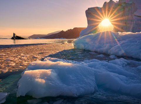 east greenland scoresbysund sunlight through ice rth