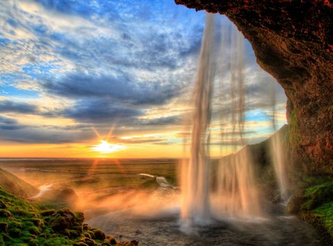 iceland seljalandsfoss summer sunset cloudy sky istk