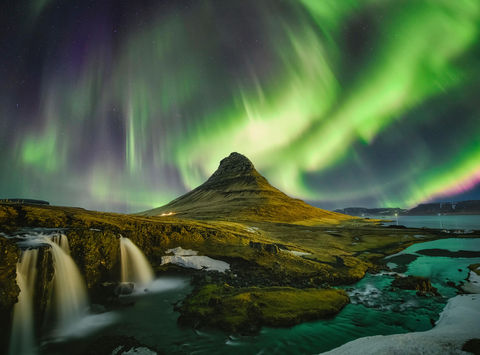 See the northern lights above Kirkjufell in Snaefellsnes on an Iceland holiday